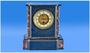 Black Marble And Slate Mantle Clock, with enamel and chapter ring dial, with French brass movement.