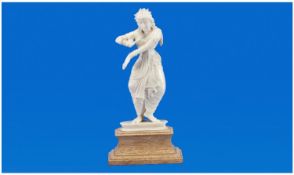 Indian Ivory Small Figure of a Dancer. Raised on stepped wooden base. c.1930`s. 6.25 inches tall