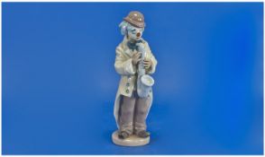 Lladro Figure `Sad Sax`. Model number 5471. Issued 1988. Height 8.5 inches. Mint condition.