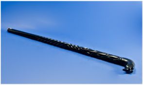 A Fine Late 19th Century African Ebony Carved Chiefs Walking Stick, with bone base. 35 inches in