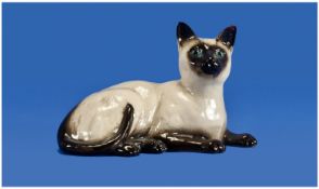 Royal Doulton Cat Figure `Siamese Cat, Lying Position`. Model number 1559. Good condition. 4.75