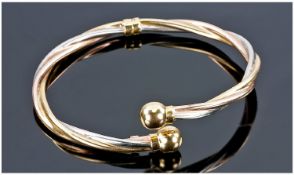 Ladies Good Quality 9ct Gold Two Tone Expanding Twist Bangle. Hallmarked 9ct. 7.9 grams. As new