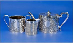 A Silver Plated 3 Piece Tea Service George III Style. Decorated with engraved floral decoration to