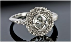 White Gold Diamond Ring, Set With A Central Round Cut Diamond Estimated Weight .60ct. Openwork