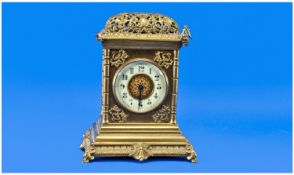 A French 19th Century Ornate Brass Mantel Clock Time Piece, with openwork dome top. 8 day movement,