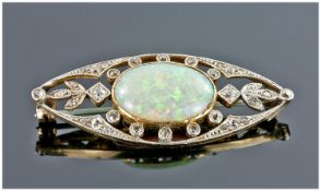 Opal And Diamond Brooch, Of Lozenge Open Work Form With Large Central Oval Opal (16 x 11 x 4mm)