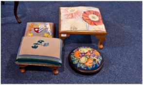 Four 20th Century Foot Stools. Two a small beech cabriole legs with floral embroided tops. One