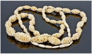 Carved Ivory Necklace Of Floral Design, Length 40 Inches.