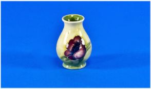 Moorcroft Miniature Vase, salesman`s sample. `Clematis` pattern. Circa 1940`s. 2 inches high.