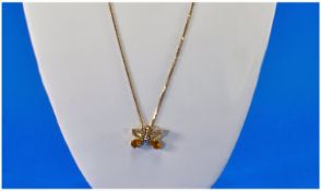 Ladies 9ct Gold Butterfly Pendant supported on a 9ct gold chain. 20 inches in length. Excellent
