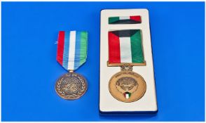 Kuwaiti Liberation Medal And A United Nations Medal.