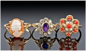 Three 9ct Gold Dress Rings, Set With a Cameo, Amethyst And White Coloured Stone Cluster & A Coral