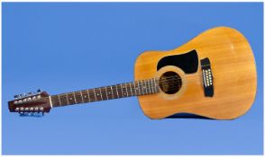 Aria`s Acoustic Guitar 12 Strings. Model number AW200T. Serial number 9003000145. Length 43 inches.