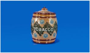 Royal Doulton Lidded Tobacco Jar, with raised and applied decoration, with the date 1889. 5.25