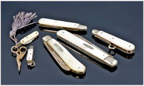 A Small Collection of Miniature and Small Pearl Handle and Silver Bladed Fruit Knives ( 6 ) In