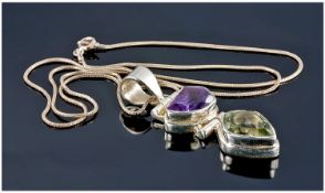 Silver Pendant Set With Two Amethyst And Citrine Coloured Stones, Suspended On a Snake Link Chain.