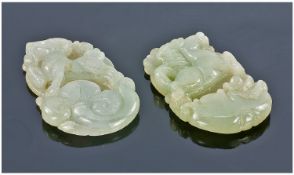 Two Jadeite Stone Carved Pendants. Approx 40 x 24mm