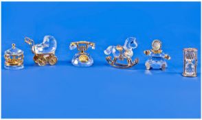 Six Boxed Swarovski Crystal Memories Miniature Figures, comprising, Pram, Doll, Telephone, Egg