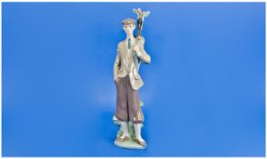 Lladro Figure `Wanting To Tee Off`. Model number 5301. Issued 1985. Height 11.5 inches. Mint