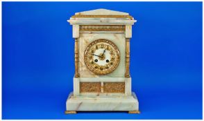 French 19th Century Onyx & Brass Mounted Mantle Clock. 8 day striking movement. Stands 14`` in
