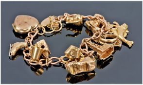 Ladies 9ct Gold Charm Bracelet Loaded With 13 Charms. Fully hallmarked. 28.1 grams.