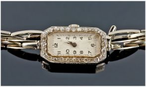 Art Deco Ladies 18ct White Gold And Diamond Cased Wrist Watch. Diamond weight 60 points, fitted on