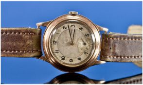 Art Deco Period 9ct Gold Circular Cased Wrist Watch, fitted on original leather strap. Hallmarked.