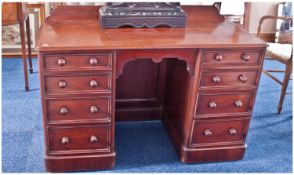 Victorian Mahogany Knee Hole Dressing Table, with banks of four draws down both sides and knee hole