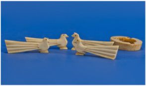 Set Of Four Art Deco Ivory Knife Rests, Modelled In The Form Of Stylised Birds, Length 3½ Inches.