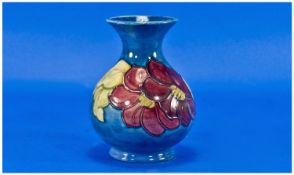Moorcroft Bulbus Shaped Vase `Clematis` Design, on powder ground. Circa 1940`s. Label to base reads