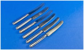 Liberty and Co. A Set of Six Silver Handled Tea Knives. The Stainless Steel Blades Marked Liberty