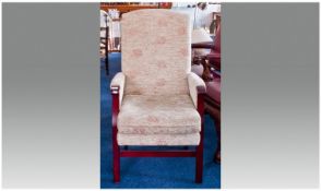 Contemporary Armchair, made by J Wedsters, the frame in a mahogany finish, upholstered in a floral