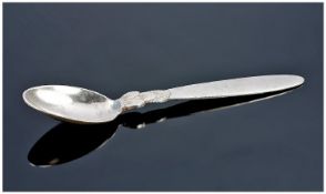 George Jensen. A Silver Spoon of Acanthus Pattern. Marked ``Georg Jensen Sterling Denmark``. Also