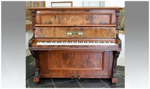 A German Overstrung Iron Framed Walnut Inlaid Upright Piano, of fine quality. With floral decorated