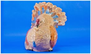 Large Pottery Model Of A Standing Turkey. Decorated in blue and brown glazes. 14 inches high, 12