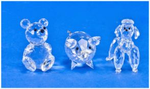 Swarovski Fine Silver Crystal Figures, 3 in total. 1) Poodle, number 7619000003. 2 1/8 inches high.