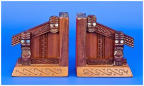 New Zealand Interest, Pair Of Carved Wood Bookends. Depicting a moon house with tiki`s outside. The