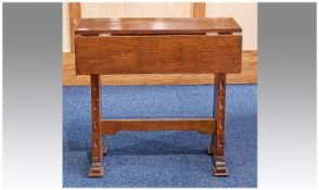 Small Oak Arts And Crafts Style Drop Leaf Table With Side End Supports Of Tapering Shape With