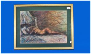 Coloured Crayon Drawing Of A Female Nude Studying, in a grass land setting. Signed indistinctly and
