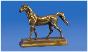 An Early 20th Century Brass Figure Of Horse Figure In Standing Position. Raised on a stepped