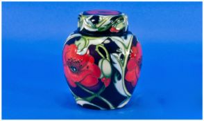 Moorcroft Modern Ginger Jar and Cover ``Red Poppy`` Pattern. Designer Rachel Bishops, date 2007.
