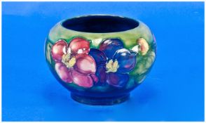 William Moorcroft Signed Footed Small Bowl ``Clematis`` Design, on green ground. Signed to base. c.