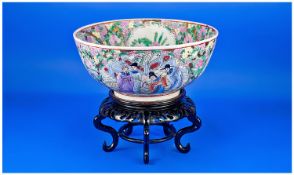 A Canton Chinese Style Bowl On Stand. Decorated in thick enamels, depicting Mandarin`s in garden