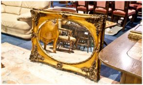 Large Gilt Reproduction Mirror In The French Rococo Style. 30 x 42 Inches