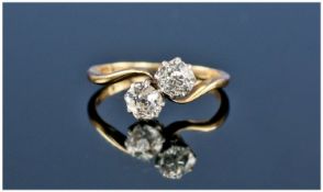 18ct Gold And Platinum Set Two Stone Diamond Twist Ring. Fully hallmarked. Estimated diamond weight