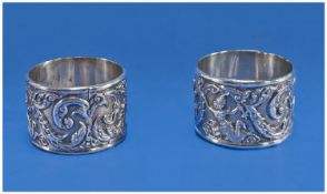A Pair of Heavy Quality Silver Napkin Rings. Each richly and boldly decorated with deities and
