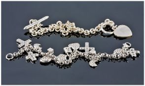 Silver Bracelet Together With A Modern Charm Bracelet