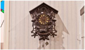 Black Forest Cuckoo Clock, Carved With A Fox And Grape Leaf Decoration To The Front, Two Iron Pine