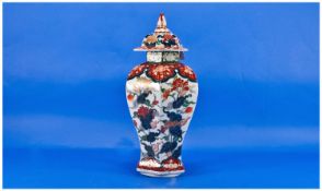 Japanese Shaped Imari Lidded Vase, of a slab sided tapering bulbous body, canister form. Decorated