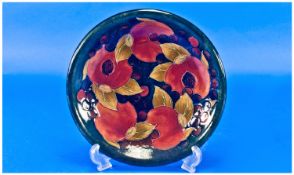William Moorcroft Shallow Lidded Bowl `Pomegranates And Berries`. Circa 1920`s. 8.75 inch diameter.